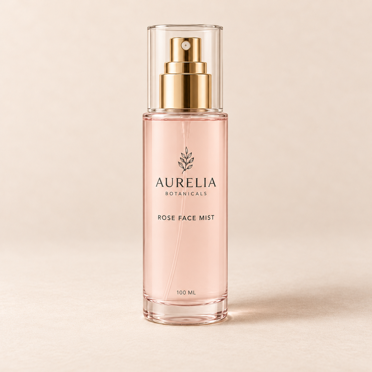 Aurelia Botanicals Rose Face Mist, 100 ml, on a warm beige background.